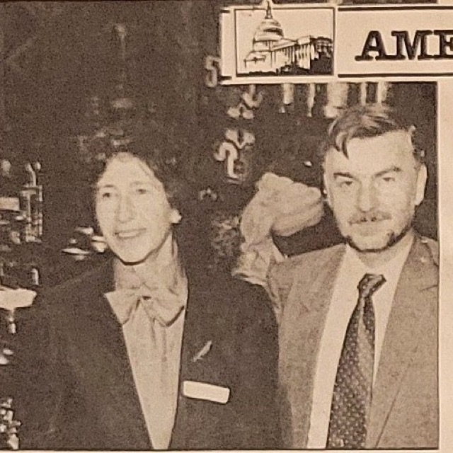 A newspaper photograph of two guests standing in the gallery on the evening of the Ottoman conference.